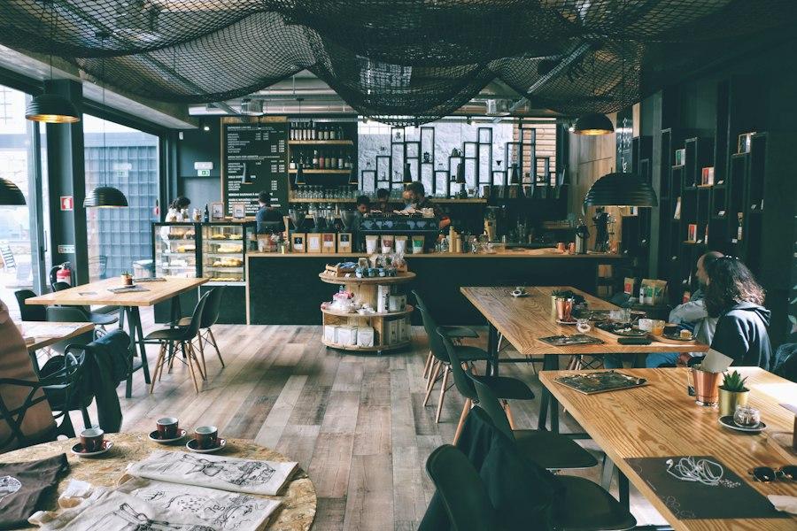 Coworking café with long wooden tables